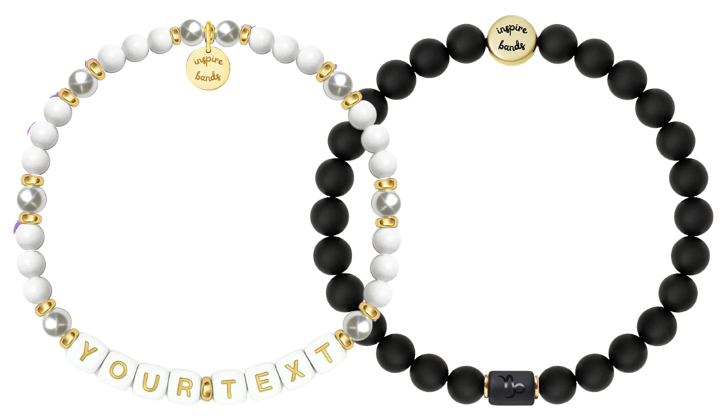 Image of one black and on white bracelet